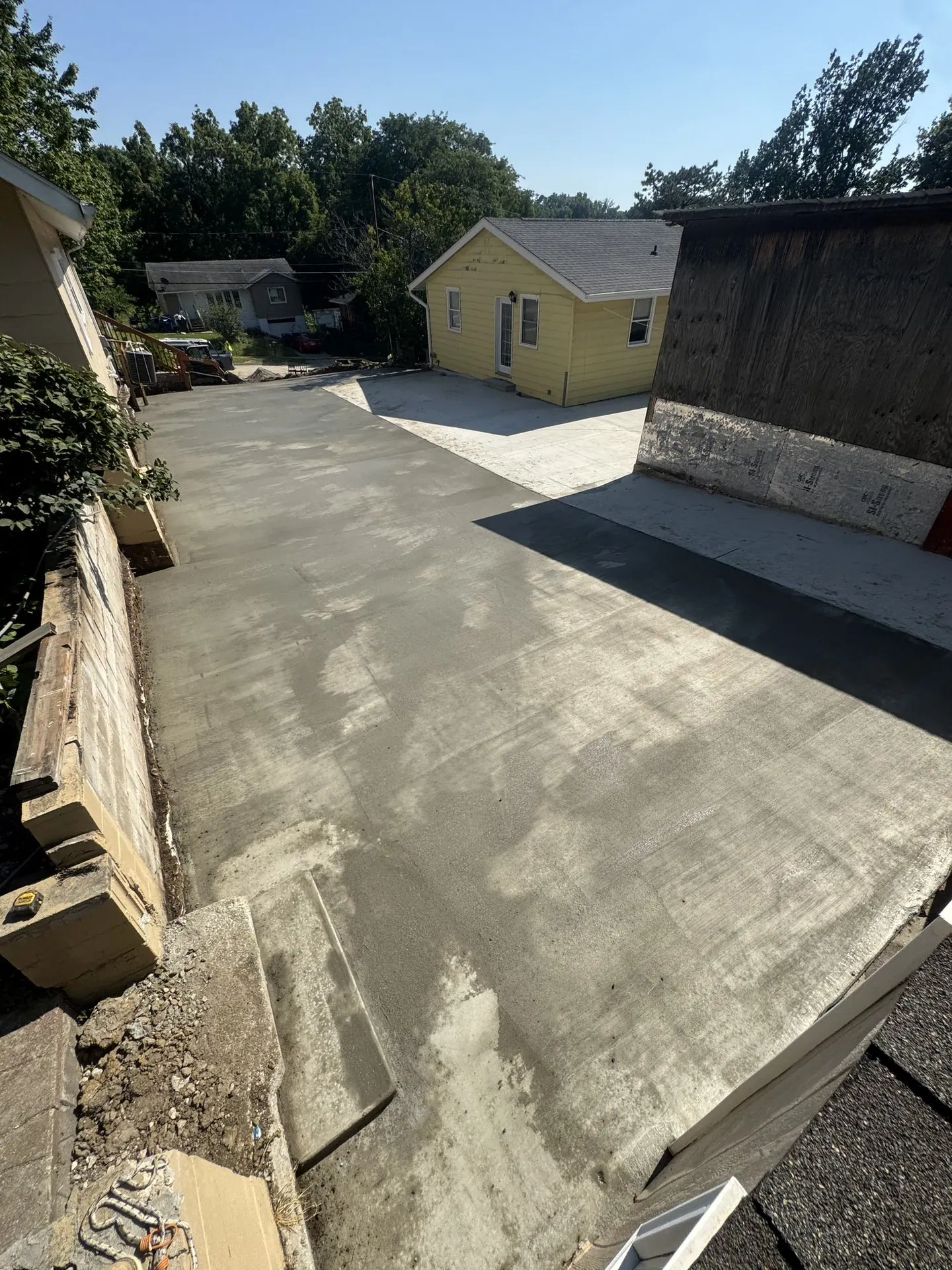 Large finished concrete driveway.